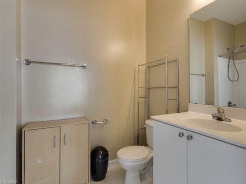 Bathroom showing toilet & sink